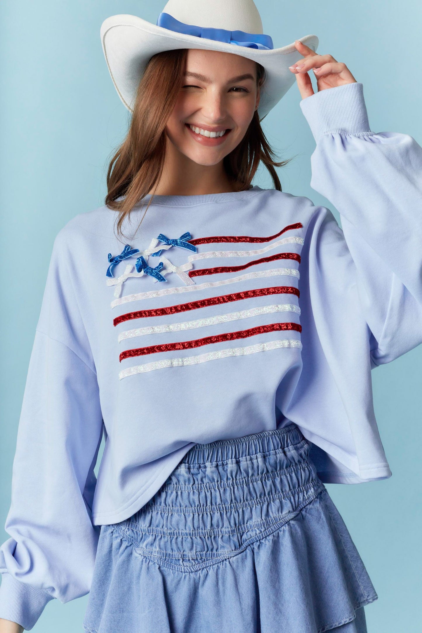 Crew Neck Flag Sparkle Trim Crop Sweatshirt - Light Blue