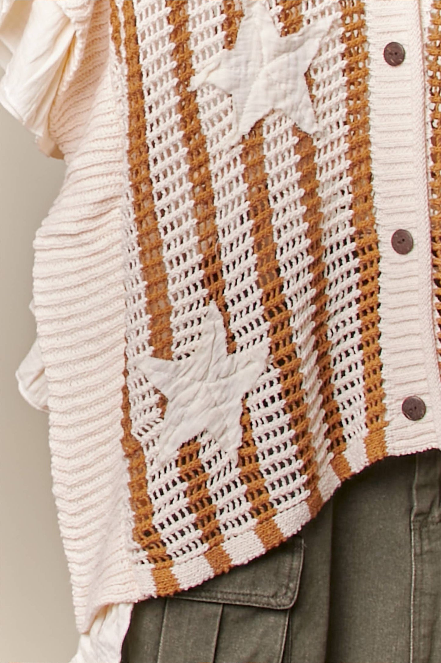 Star Patch Open-Knit Top with Ruffle Detail