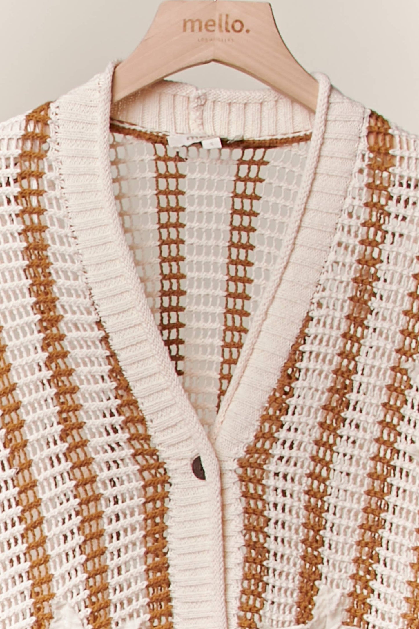 Star Patch Open-Knit Top with Ruffle Detail