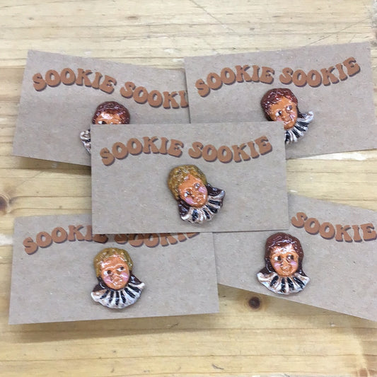 Doll head hat pin