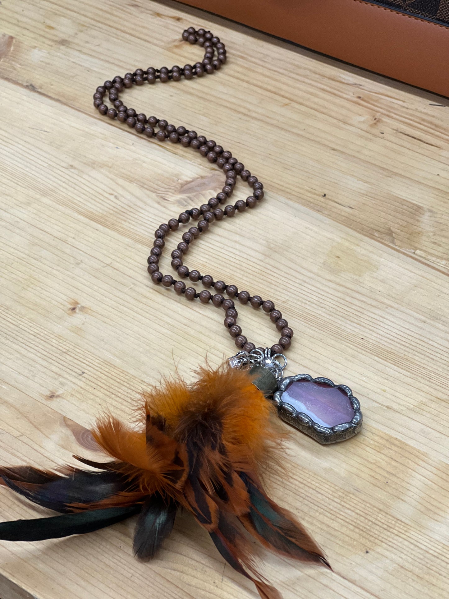 Beaded Necklace with Feather Tassel
